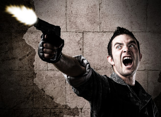 man shooting a gun