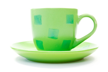 green coffee cup over a white background.