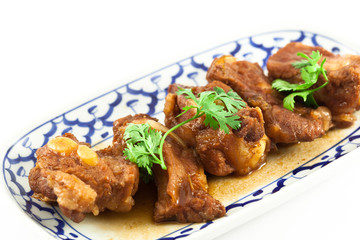 Pork ribs with sweet sauce  on white background