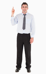 Businessman pointing at copy space