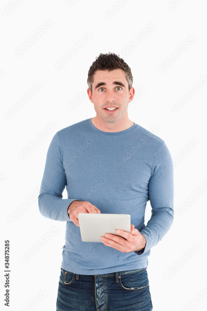 Poster portrait of a man holding a tablet computer