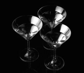 Silhouette of Three martini glass. Black and white graphic.