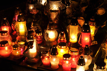 Candle flames illuminatingduring the night of All Saint's Day