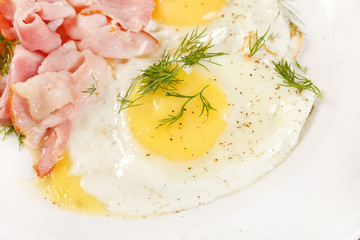 fried eggs with bacon