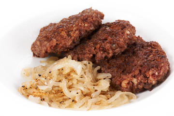 Cutlets with marinated onions