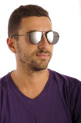 Young man wearing aviator sunglasses, isolated on white