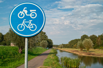 bike/moped road sign in dutch landscape