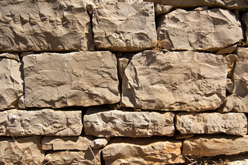 Muro mattoni pietra