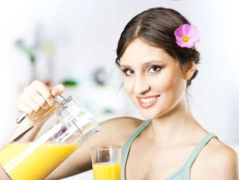 Young and beautiful woman having breakfast in the morning