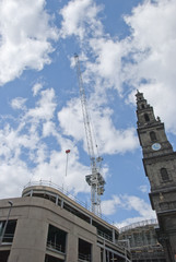 Fototapeta na wymiar Clock Tower and White Tower Crane