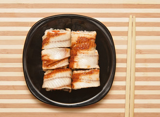 Sushi with chopsticks