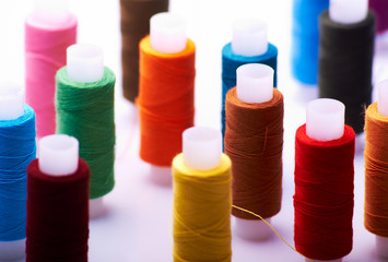 Multicolored spools of threads