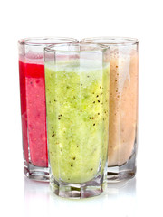 Delicious fruit smoothies isolated on white