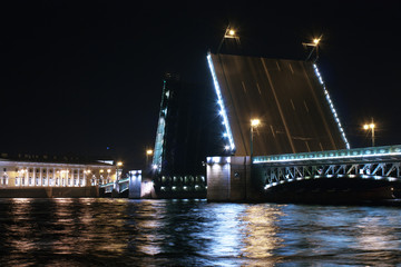 Fototapeta na wymiar Drawbridge in St. Petersburg at night