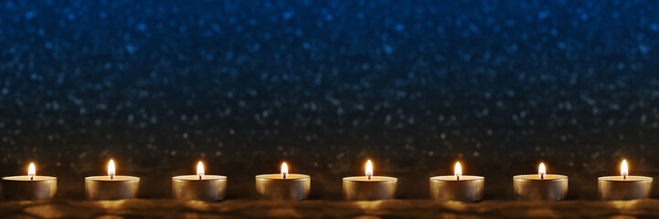 Candles on blue background