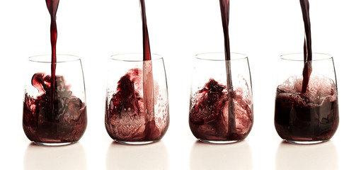 pouring wine on a glass
