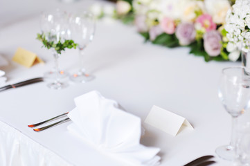 Empty place card on table set for a party