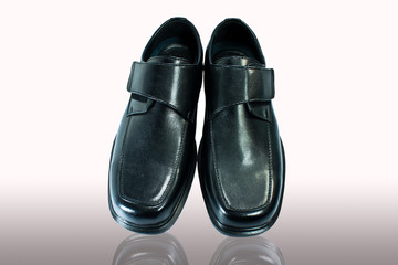 Men's black leather shoes.