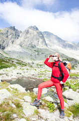 woman backpacker at Five Spis Tarns, Vysoke Tatry (High Tatras),