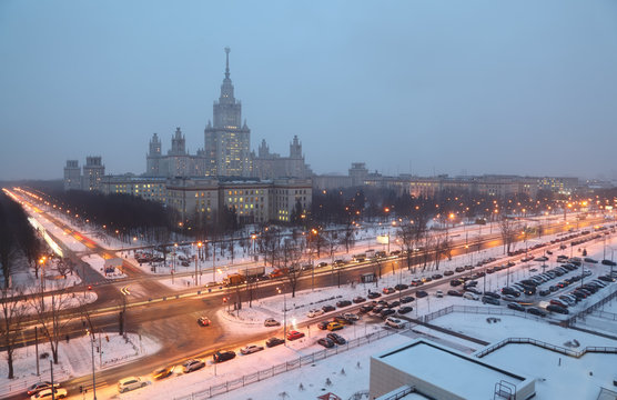 Main building of Moscow State University at night winter