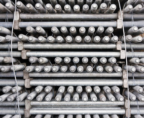 Many layers of machine bolts vertical