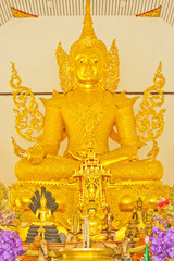 golden buddha image at a temple in Ratchaburi,Thailand