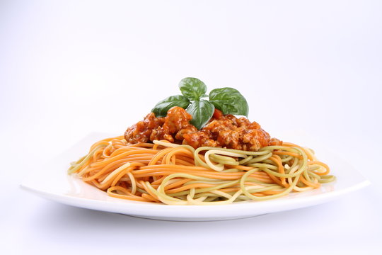 Colorful Spaghetti bolognese on a plate