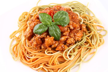 Colorful Spaghetti bolognese on a plate