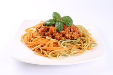 Colorful Spaghetti bolognese on a plate