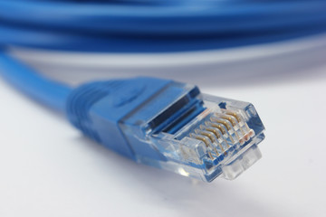 Blue computer cable from white background