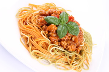 Colorful Spaghetti bolognese on a plate
