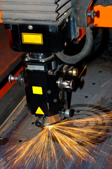 Industrial laser with sparks flying around