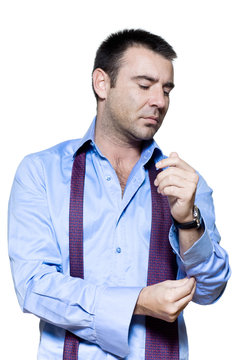 Portrait Of A Mature Man Getting Dressed