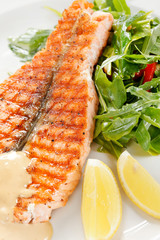 salmon steak with salad
