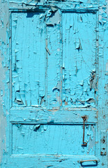 cracked old painted blue door