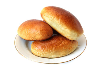 Pies in the plate on a white background