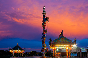 dragon statue and sunset sky