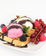 Waffle with vanilla and strawberry ice cream