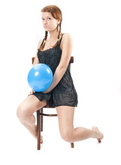 Young smart brunette in little black dress