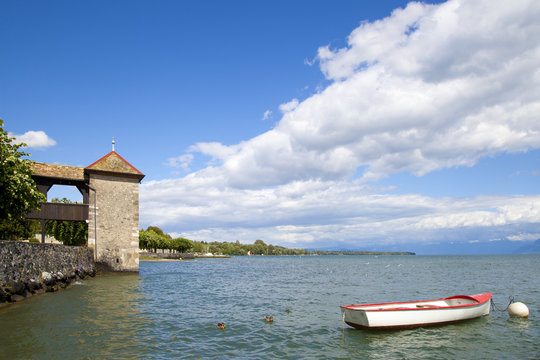 Rowboat in the Rolle Castle jetty in Switzerland