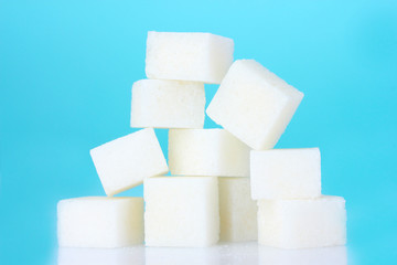 refined sugar on blue background