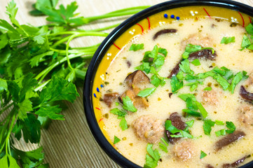 Mushrooms soup with meatballs
