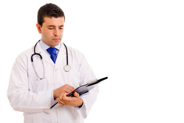 Image of young doctor looking at the notebook, isolated on white