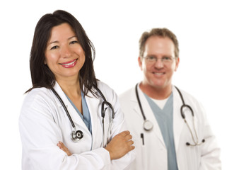 Fototapeta premium Hispanic Female Doctor and Male Colleague Behind