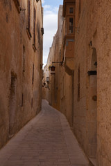 Fototapeta na wymiar narrow town street