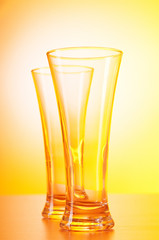 Wine glasses against gradient background
