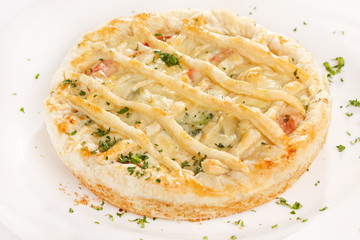 tasty quiche with cheese and herbs