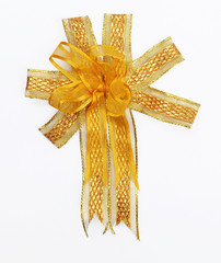 golden ribbon bow on the white background
