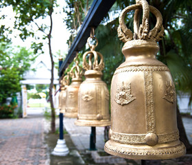 A close up row of bell in buddisht temple.