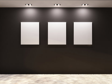 Gallery. Empty frames on a black wall in interior